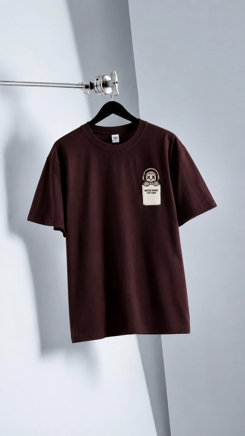  T-shirt featuring a small coffee
